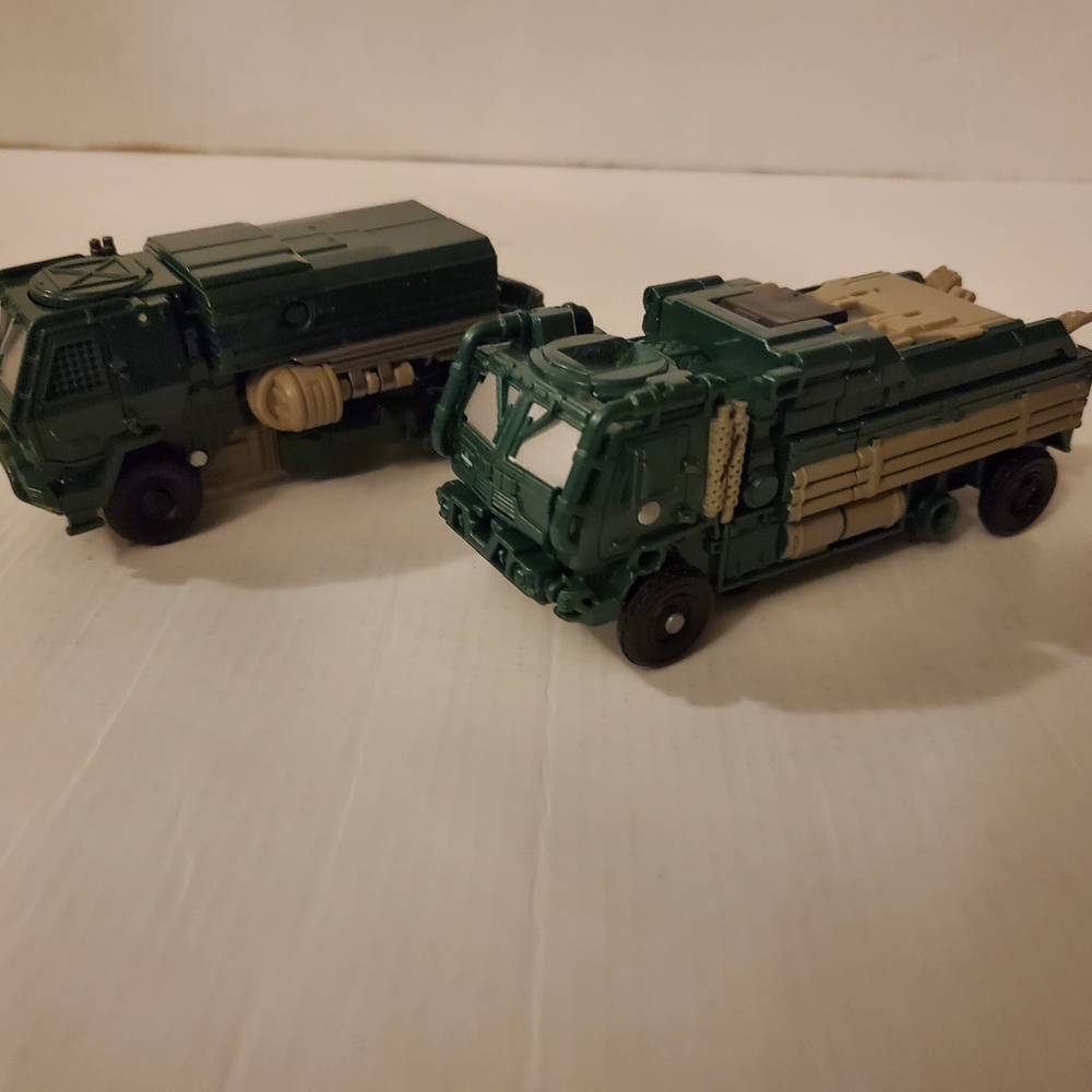 2 TRANSFORMERS AGE OF EXTINCTION AUTOBOT QUICK DRAW HOUND Action Figures